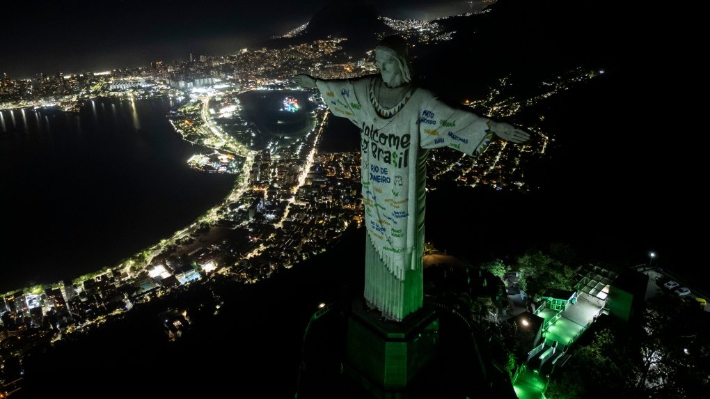 the christ the redeemer statue is illuminated 1 6650922 1700315626058